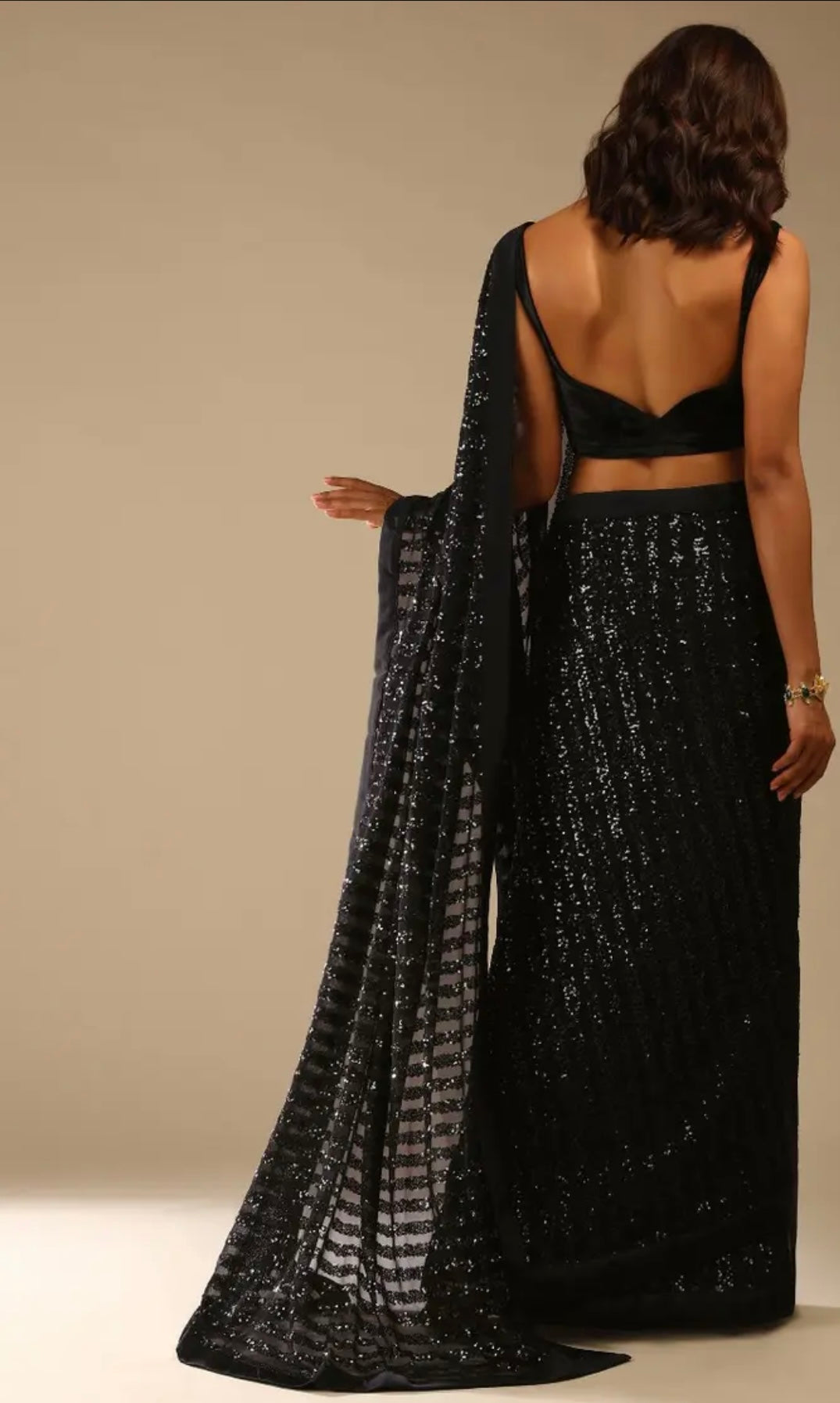 Black Ready Pleated Saree Embellished In Sequins And A Sleeveless Velvet Blouse With A Front Cut Out