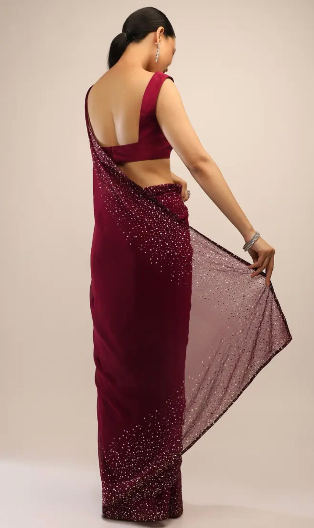 Maroon Saree In Georgette With Kundan Embellished Border